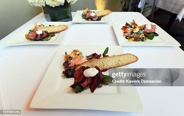 Food prepared by Lucques chef Suzanne Goin which will be served at the 19th annual SAG Awards is displayed along with Gallo wines, Champagne...