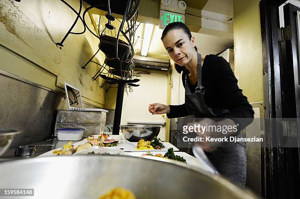 Lucques chef Suzanne Goin prepares a vegan plate in the kitchen of her restaurant Lucques to be served at the 19th annual SAG Awards during food and...