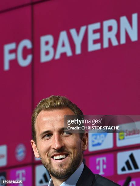 Bayern Munich's English forward Harry Kane attends a press conference on his presentation after signing a four-years deal with German first division...