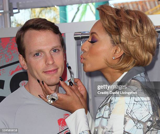 Singer Keri Hilson with model Daniel Hitchingham launch the Gillette "Kiss & Tell" Experiment on the Santa Monica Pier on January 16, 2013 in Santa...