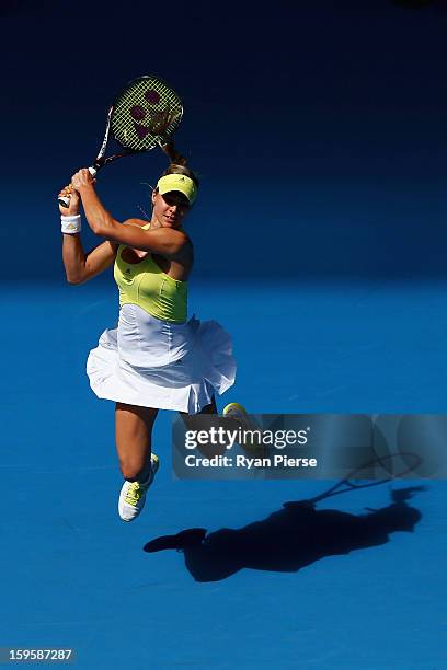 Maria Kirilenko of Russia plays a backhand in her second round match against Shuai Peng of China during day four of the 2013 Australian Open at...