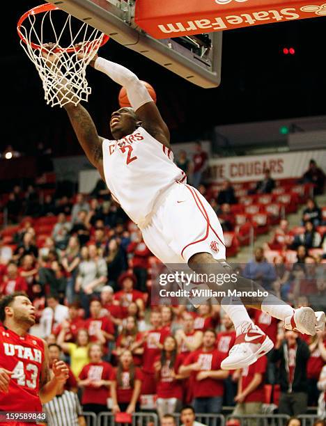 Guard Mike Ladd of the Washington State Cougars misses a dunk shot during the first half of the game against the Utah Runnin' Utes at Beasley...