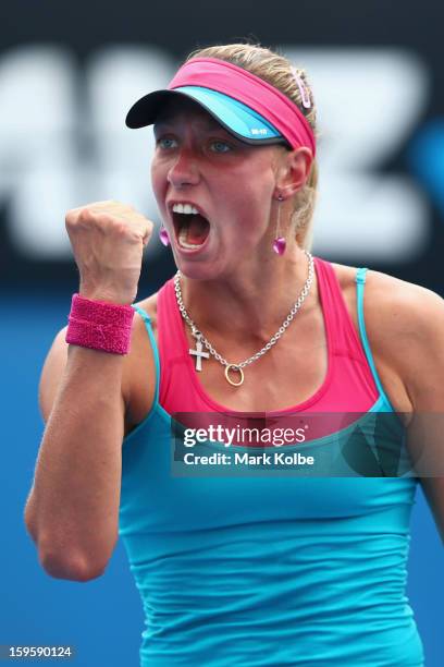 Yanina Wickmayer of Belgium celebrates a point in her second round match against Jana Cepelova of Slovakia during day four of the 2013 Australian...