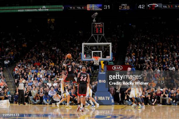 LeBron James of the Miami Heat makes a shot, passing the 20,000 point career milestone, during a game against the Golden State Warriors on January...