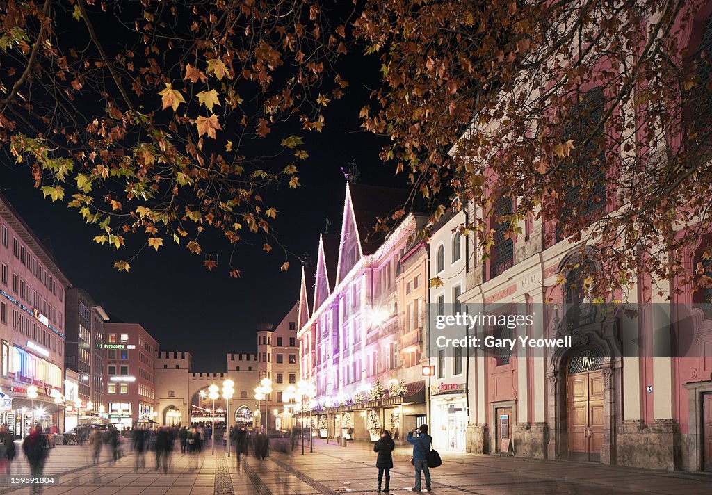 Busy street by Marienplatz, Munich at night