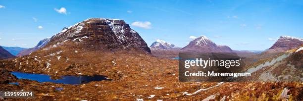 on the trail to the beinn eighe mountain - dirt road stock pictures, royalty-free photos & images