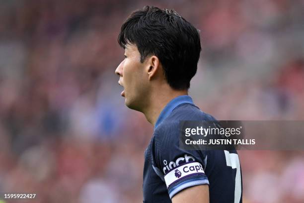 New captain, Tottenham Hotspur's South Korean striker Son Heung-Min looks on during the English Premier League football match between Brentford and...