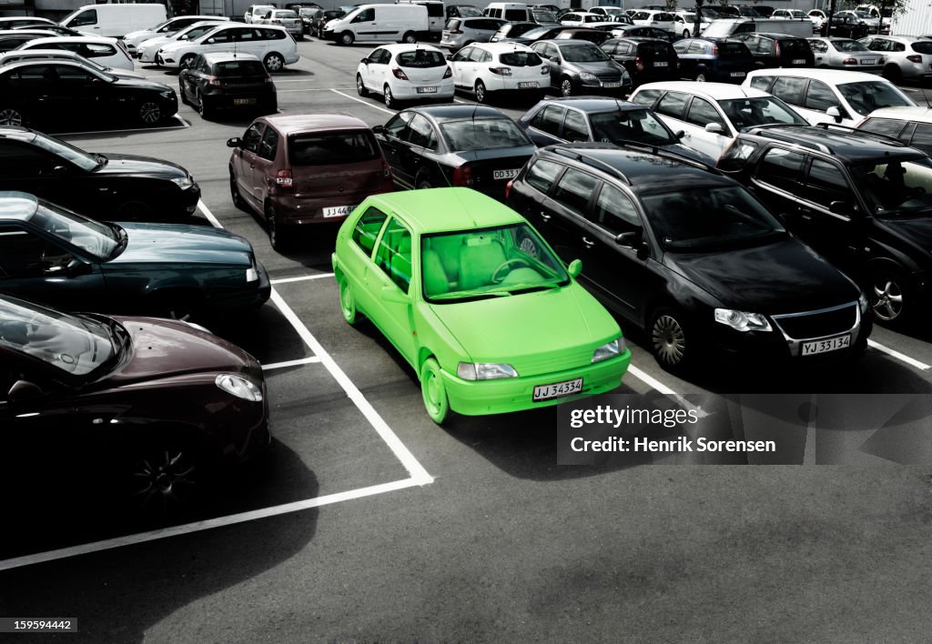 Green car, sustainable energy. (parking lot)