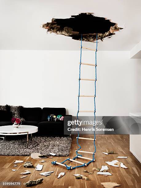 hole in the wall - ceiling stock pictures, royalty-free photos & images