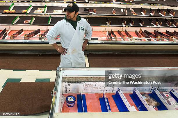 Local grocery chain Magruder's is closing and offered 50 percent off Tuesday, January 15, 2013 in Gaithersburg, MD.