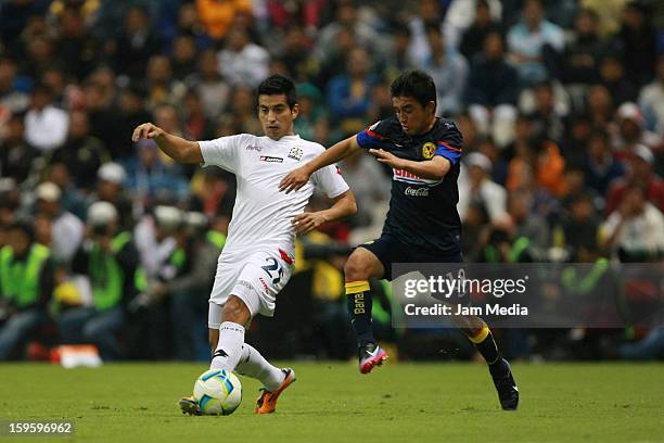 Christian Bermudez of America struggles for the ball with Carlos Cuevas of Altamira during the Clausura 2013 Copa MX at Azteca Stadium on january 16,...