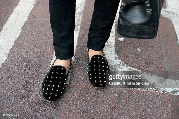 Javid Rezai fashion journalist wearing super glamourous shoes and River island jeans on day 2 of London Mens Fashion Week Autumn/Winter 2013, on...