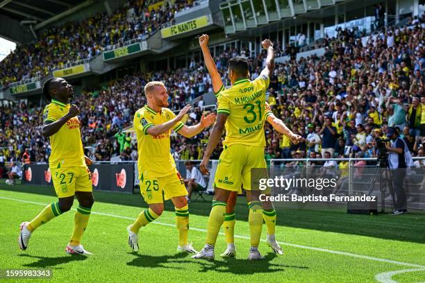 Mostafa MOHAMED of Nantes celebrates his goal with teammates during the French Ligue 1 Uber Eats soccer match between Nantes and Toulouse at Stade de...