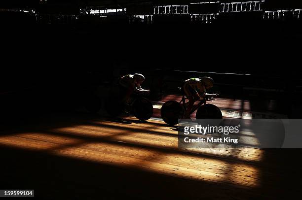 Members of the Australian Gold team compete in the Men's U19 Team Sprint Final during day two of the 2013 Australian Youth Olympic Festival at Dunc...