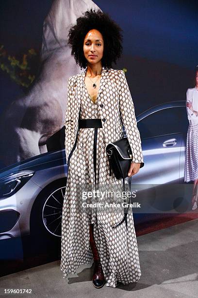 Fashion Week guest wearing Schumacher attends Mercedes-Benz Fashion Week Autumn/Winter 2013/14 at bthe Brandenburg Gate on January 17, 2013 in...