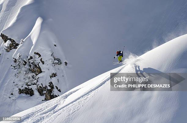 Skier competes during the 5th Linecatcher at the "Cirque de Fond Blanc" on January 16, 2013 in Les Arcs ski resort, French Alps. AFP PHOTO/PHILIPPE...