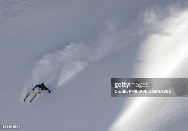 Skier competes during the 5th Linecatcher at the "Cirque de Fond Blanc" on January 16, 2013 in Les Arcs ski resort, French Alps. AFP PHOTO/PHILIPPE...