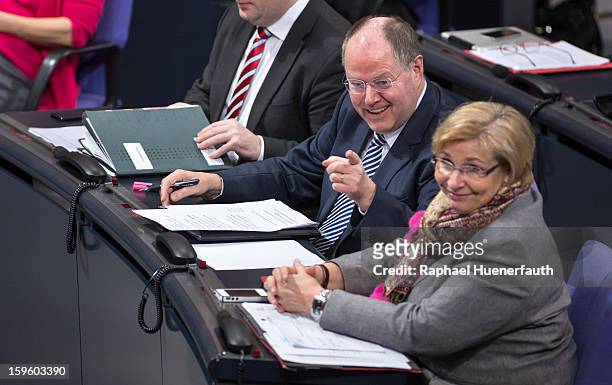 Peer Steinbrueck , chancellor candidate of the German Social Democrats , and Petra Ernstberger , MP SPD, during a debate on the Annual Economic...
