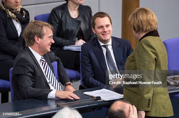 Head of the German Chancellery Ronald Pofalla , German Health Minister Daniel Bahr and German Chancellor Angela Merkel during a debate on the Annual...