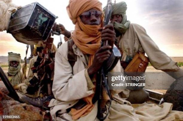 Picture taken with a mobile phone on January 12, 2013 reportedly shows Islamist insurgents in Gao. Fresh clashes erupted overnight between the Malian...