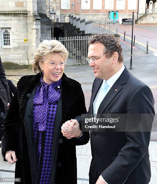 In this handout image provided by Justin MacInnes, Hans-Peter Friedrich, German Interior Minister with Viviane Reding, Vice President of the European...