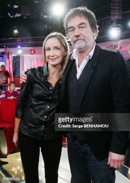French actress Catherine Marchal and husband actor and director Olivier Marchal attend 'Vivement Dimanche' TV show on October 30, 2012 in Paris,...