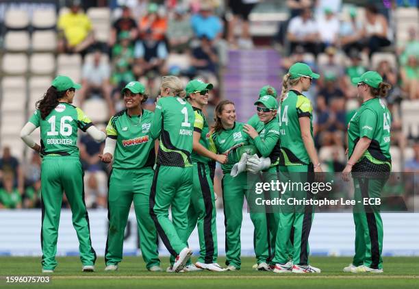 Rhianna Southby of Southern Brave is congratulated by team mates after taking a catch to dismiss Alice Davidson-Richards of Northern Superchargers...