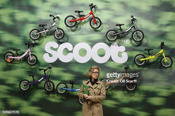 Woman admires a display of children's bikes at the London Bike Show which is being held in the ExCeL Centre on January 17, 2013 in London, England....