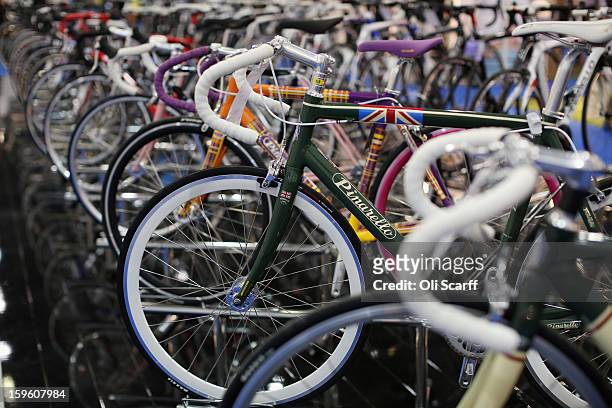 Pinarello bikes are displayed on their stand at the London Bike Show which is being held in the ExCeL Centre on January 17, 2013 in London, England....