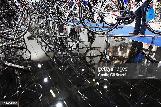 Pinarello bikes are displayed on their stand at the London Bike Show which is being held in the ExCeL Centre on January 17, 2013 in London, England....