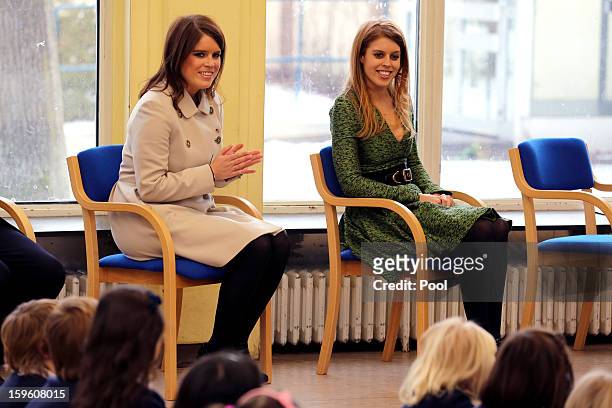 Princess Eugenie and Princess Beatrice of York visit the British School in Berlin on January 17, 2013 in Berlin, Germany. The royal sisters are in...