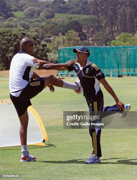 Lonwabo Tsotsobe and Aaron Phangiso attend the South African national cricket team nets session and press conference at Claremont Cricket Club on...