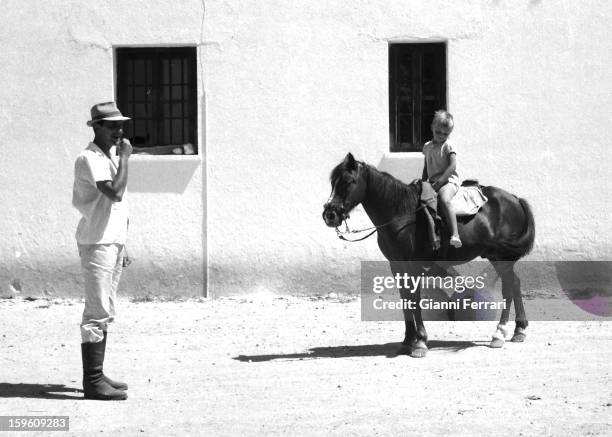 The Spanish bullfighter Luis Miguel Dominguin at his home in Villa Paz with his son Miguel Cuenca, Castilla La Mancha, Spain