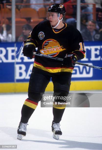 Pavel Bure of the Vancouver Canucks skates on the ice during an NHL game against the Los Angeles Kings on March 4, 1995 at the Great Western Forum in...