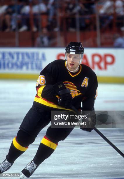 Pavel Bure of the Vancouver Canucks skates on the ice during an NHL game against the Los Angeles Kings circa 1997 at the Great Western Forum in...