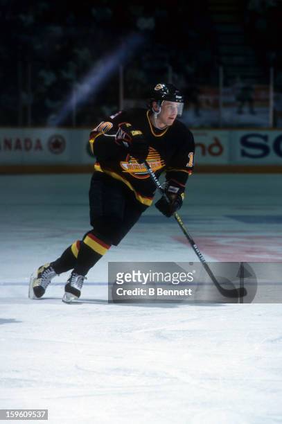 Pavel Bure of the Vancouver Canucks skates on the ice during an NHL game against the Winnipeg Jets on March 14, 1995 at the Winnipeg Arena in...