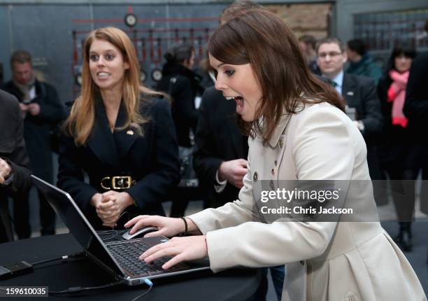 Princess Beatrice of York and Princess Eugenie of York laugh as they visit e-commerce company 'Zalando' on January 17, 2013 in Berlin, Germany. The...