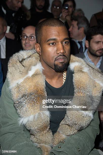 Kanye West attends the Louis Vuitton Men Autumn / Winter 2013 show as part of Paris Fashion Week on January 17, 2013 in Paris, France.