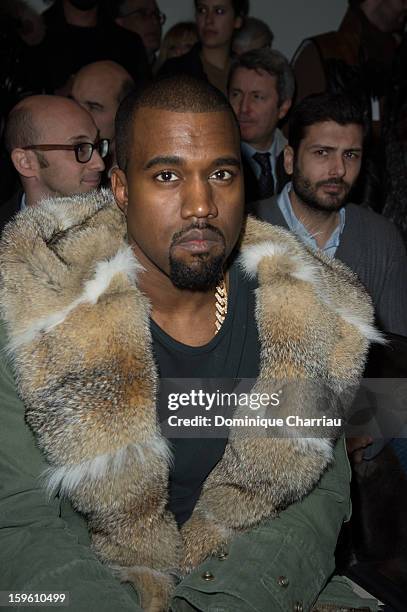 Kanye West attends the Louis Vuitton Men Autumn / Winter 2013 show as part of Paris Fashion Week on January 17, 2013 in Paris, France.