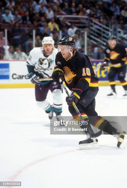 Pavel Bure of the Vancouver Canucks skates on the ice during an NHL game against the Mighty Ducks of Anaheim on February 17, 1995 at the Arrowhead...
