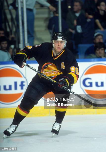 Pavel Bure of the Vancouver Canucks skates on the ice during an NHL game against the New York Islanders on November 13, 1996 at the Nassau Coliseum...