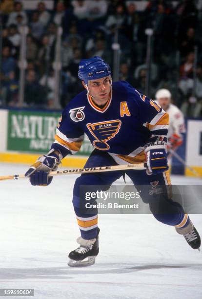 Adam Oates of the St. Louis Blues skates on the ice during an NHL game against the New York Islanders on December 10, 1991 at the Nassau Coliseum in...