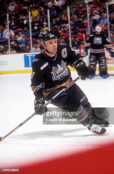 Adam Oates of the Washington Capitals skates on the ice during an NHL game against the New Jersey Devils on January 14, 2000 at the Continental...