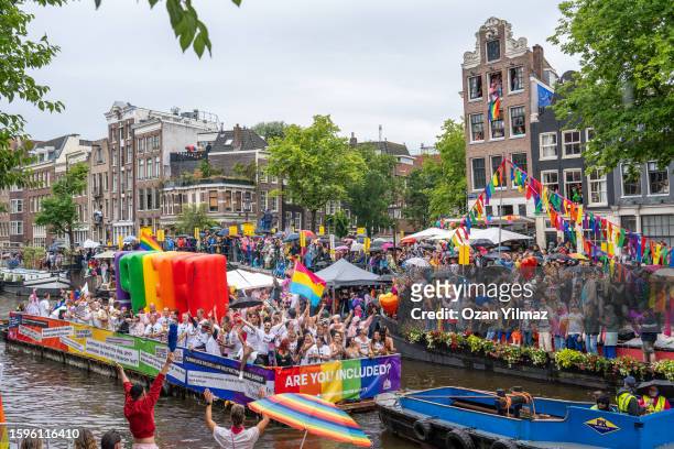 Participant boats on the canal celebrating Pride on August 5, 2023 in Amsterdam, Netherlands. 80 Boat Participants cruise through the city's 17th...