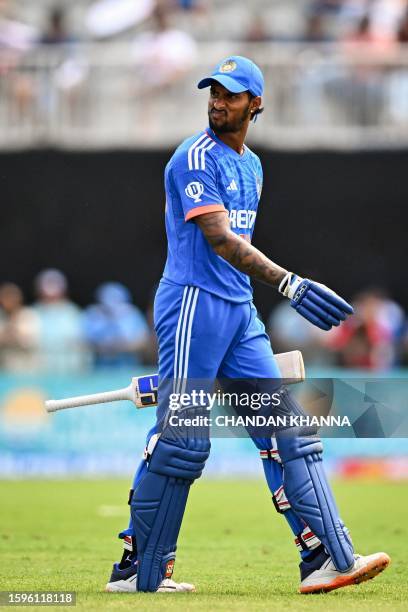 Tilak Varma, of India walks back after getting dismissed during the fifth and final T20I match between West Indies and India at the Central Broward...