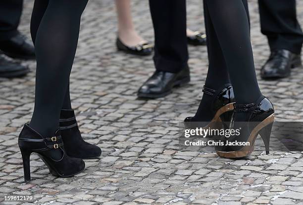 Princess Beatrice and Princess Eugenie pose next to a Mini in front of Brandenburg Gate as they promote the GREAT initiative on January 17, 2013 in...