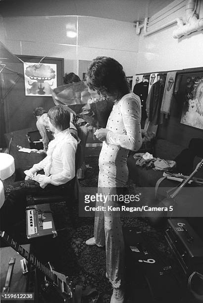 Mick Jagger of the Rolling Stones is photographed getting ready backstage in 1972 in San Francisco, California. CREDIT MUST READ: Ken Regan/Camera 5...