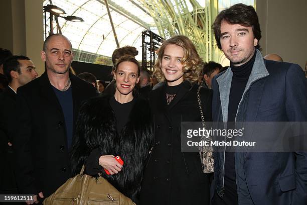Dino Chapman, Tiphaine, Natalia Vodianova and Antoine Arnault attend the Louis Vuitton Men Autumn / Winter 2013 show as part of Paris Fashion Week on...