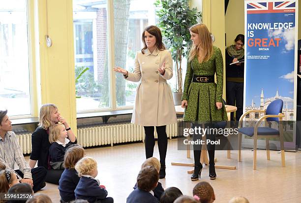 Princess Eugenie and Princess Beatrice of York visit the British School in Berlin on January 17, 2013 in Berlin, Germany. The royal sisters are in...