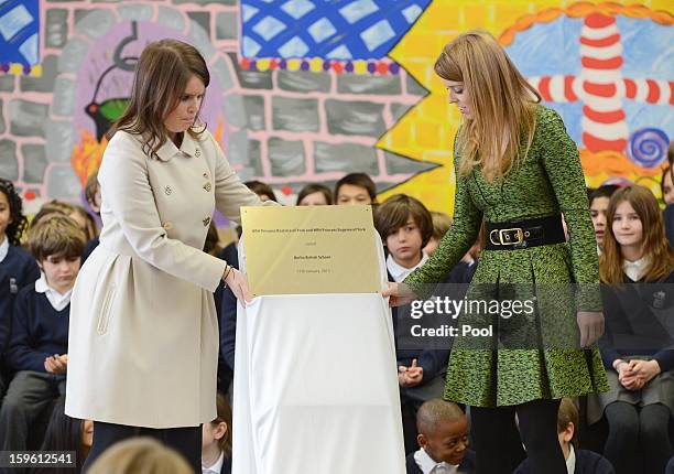 Princess Eugenie and Princess Beatrice of York visit the British School in Berlin on January 17, 2013 in Berlin, Germany. The royal sisters are in...
